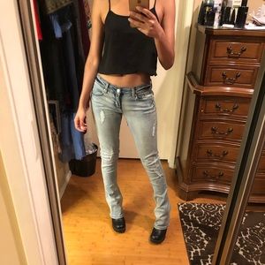 Low-Rised Flared distressed jeans